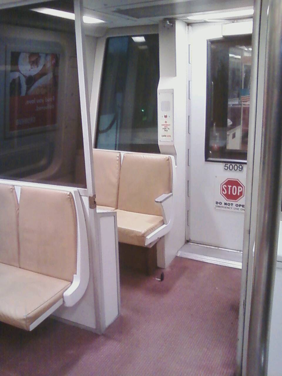WMATA/DC Metro 'private section' of a 5000-series car (half of 
motorman's cab which provides seating when not in use to operate the 
train), offering a very private ride. As in car 1183 above, the carpeting 
in this 5000 series car is relatively new and makes the ride even 
quieter. For further details, please visit www.wirelessnotes.org.